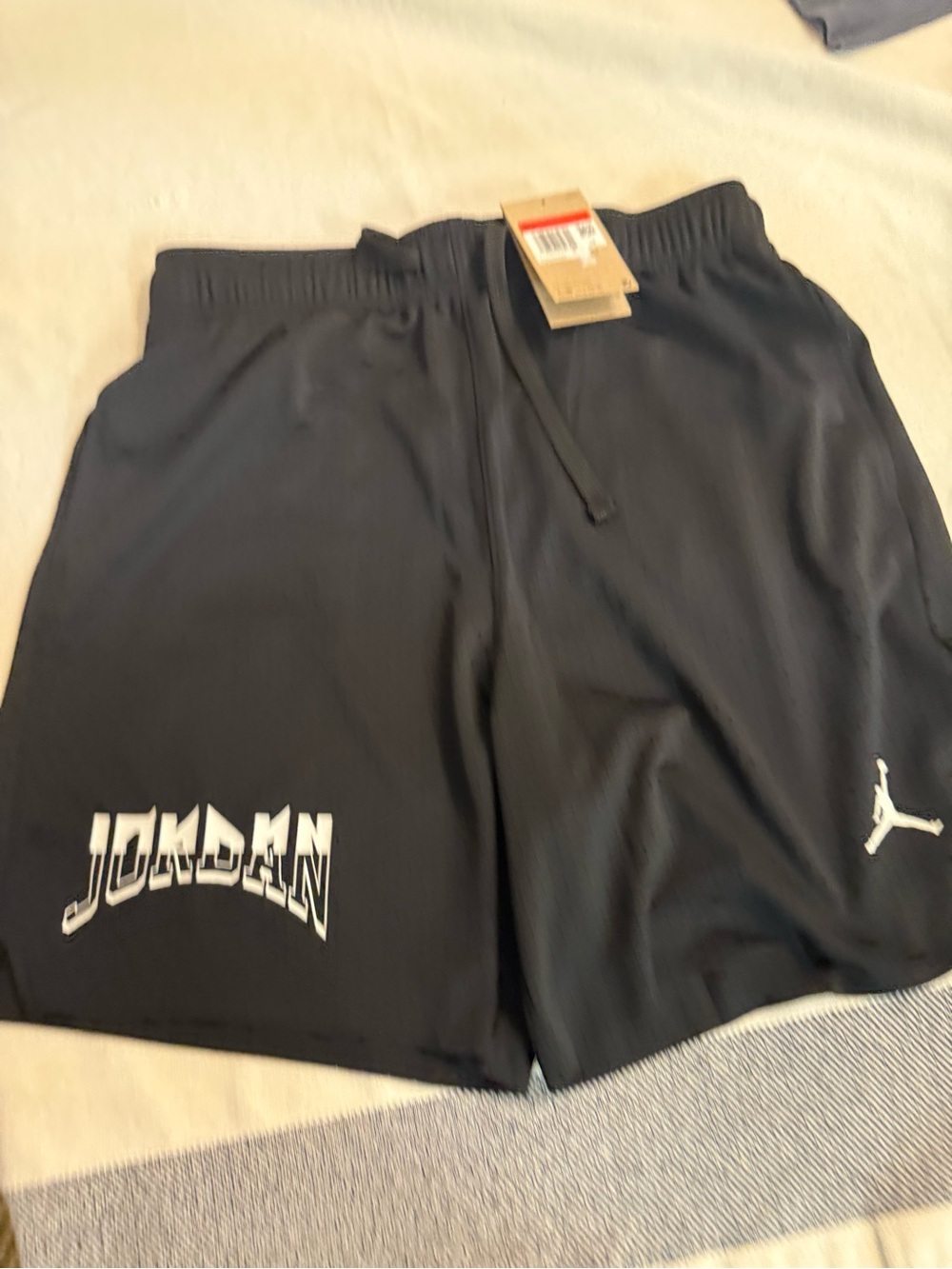 Nike Men's Black Athletic Shorts with White Branding